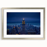 Textured abstract art print of NYC skyline in muted gray tones on a silver-framed canvas, ideal for bedroom art.