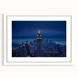 Abstract art print of the NYC skyline in muted gray tones on a framed white canvas, suitable for dining room art.