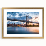 Extra large wall art of the Manhattan Bridge in textured gray and blue tones, framed in gold, ideal for living room decor.