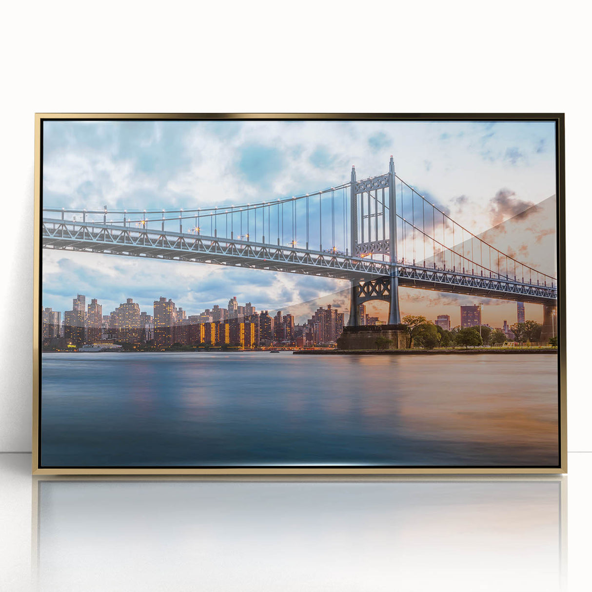 Acrylic print of the Manhattan Bridge in muted gray tones, framed in gold, suited for modern art wall decor.