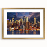 Extra large abstract art print of Manhattan skyline in muted gray and gold tones on a framed canvas.