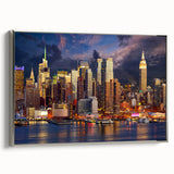 Framed canvas of a vintage-style Manhattan skyline in muted black and colorful highlights.