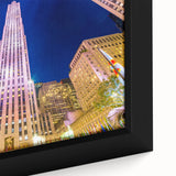 Extra large framed canvas of a textured New York City skyline in black with colorful highlights, ideal for living room decor.