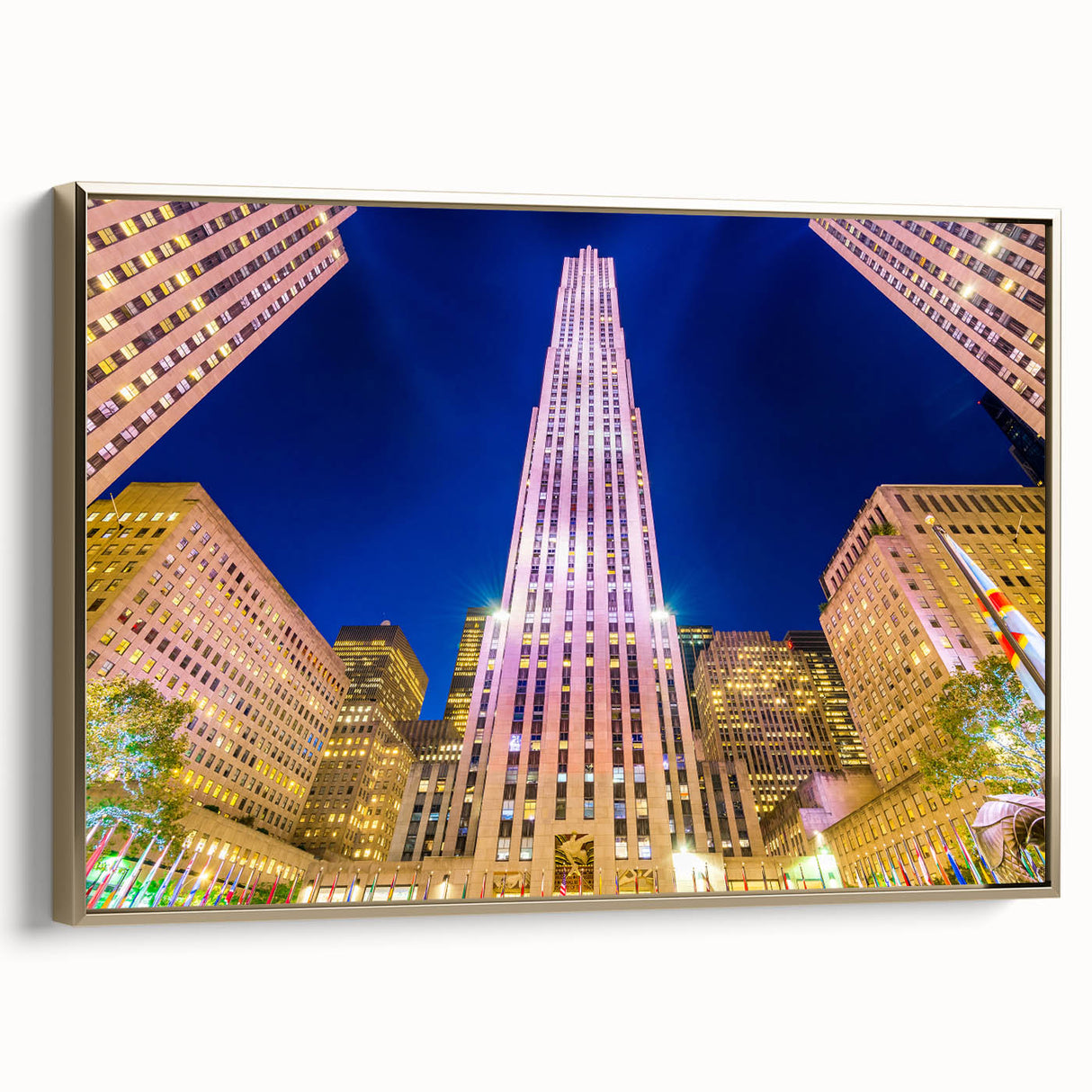 Framed canvas wall art of the New York City skyline in black and gold tones, ideal for bedroom decor.