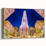 Framed canvas wall art of the New York City skyline in black and gold tones, ideal for bedroom decor.