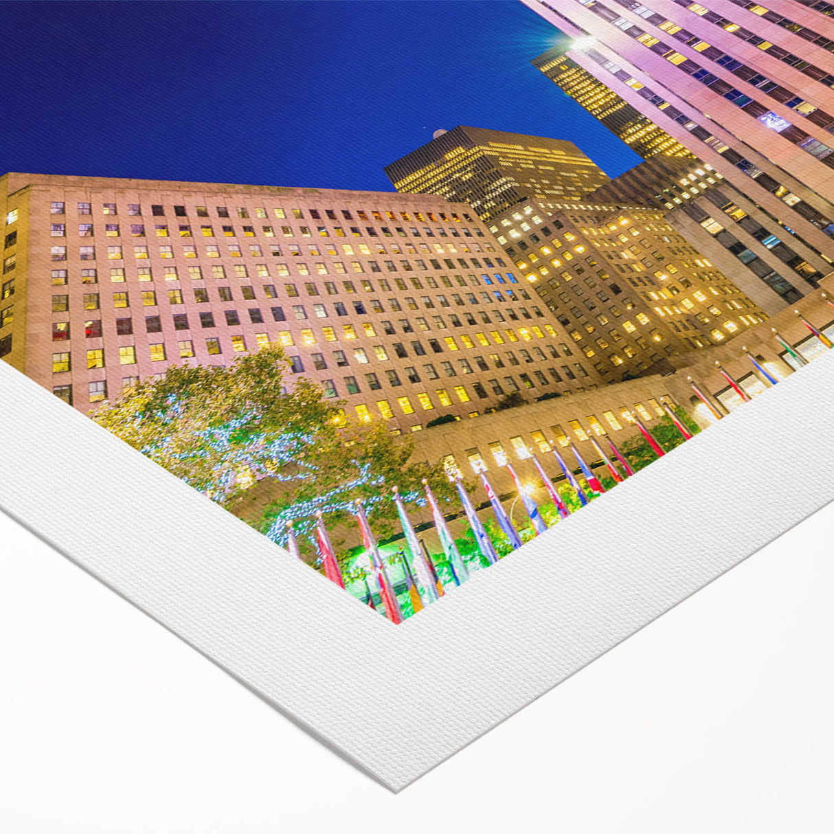 Art Deco poster of NYC Rockefeller Center in muted gray tones on rolled canvas, suitable for dining room decor.