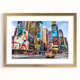Extra large wall art of abstract Times Square scene in textured colors on a gold-framed canvas.
