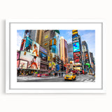 Abstract art print of Times Square with vibrant neon colors on a framed white mat, suitable for bedroom or dining room decor.