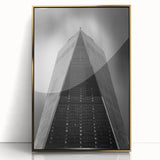 Acrylic print of NYC Trade Center in gold tones, framed, featuring mid-century modernist style.