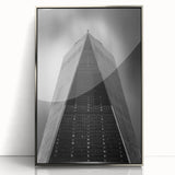 Mid-century modernist art depicting New York City skyline in muted gray tones on a framed acrylic print.