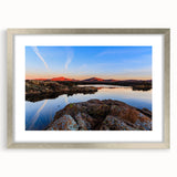 Textured art print of abstract Oklahoma scenery in muted earth tones, framed in silver, ideal for bedroom wall decor.