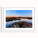 Abstract art print of Oklahoma scenery in subdued earth tones, framed with a white mat, ideal for dining room decor.