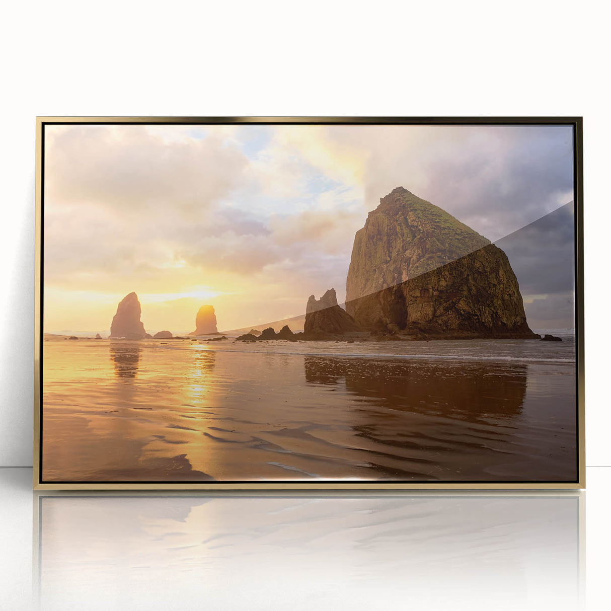 Large art print of Cannon Beach in muted earth tones, framed acrylic, mid-century modernist style.