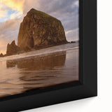 Textured black wall art of Cannon Beach, Oregon with colorful accents on framed canvas.