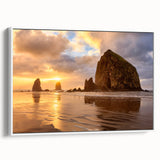 Vintage poster art of Cannon Beach, Oregon on a framed canvas, featuring a colorful palette, ideal for living room decor.