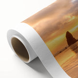 Art deco poster of Cannon Beach, Oregon in muted blue and sand tones on rolled canvas, suitable for nursery wall decor.