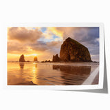 Rolled print of Cannon Beach, Oregon, in muted gray and blue tones, ideal for art wall dining room.