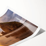 Extra large wall art of Cannon Beach in Oregon, featuring a line art floral design in muted earth tones on a rolled print.