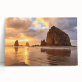 Black and white stretched canvas of Cannon Beach, Oregon, with large rock formations, ideal for kitchen wall art.