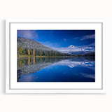 Abstract art print of Mount Hood in muted blue and green tones on a framed canvas, ideal for bedroom or dining room decor.