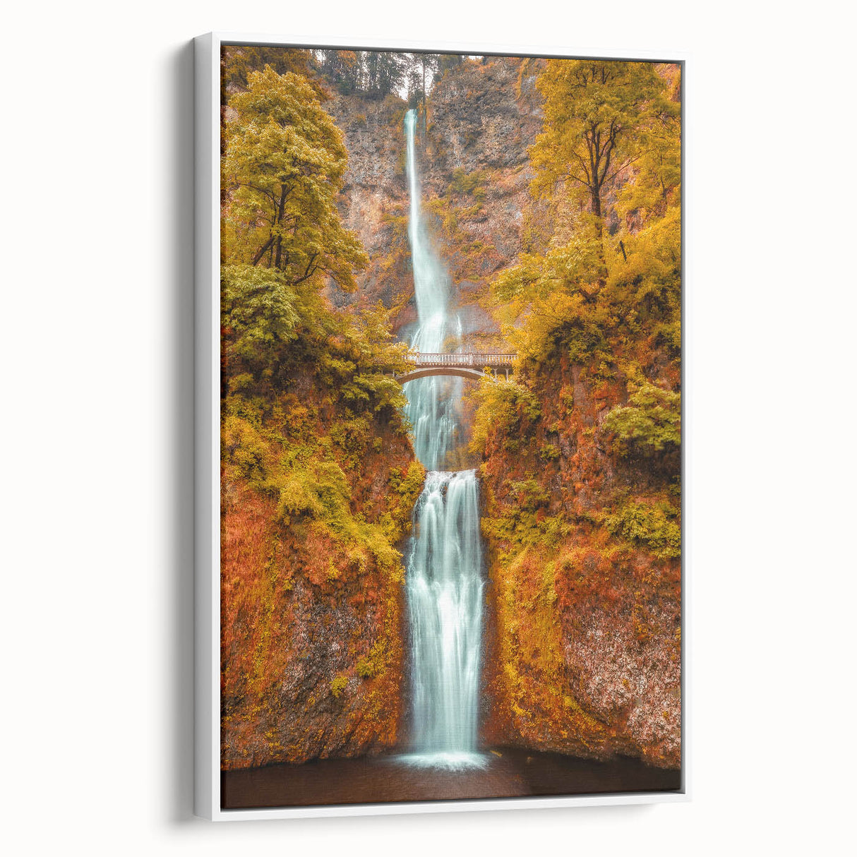 Vintage poster art of Multnomah Falls in Oregon, featuring vibrant green and blue tones on a framed canvas.
