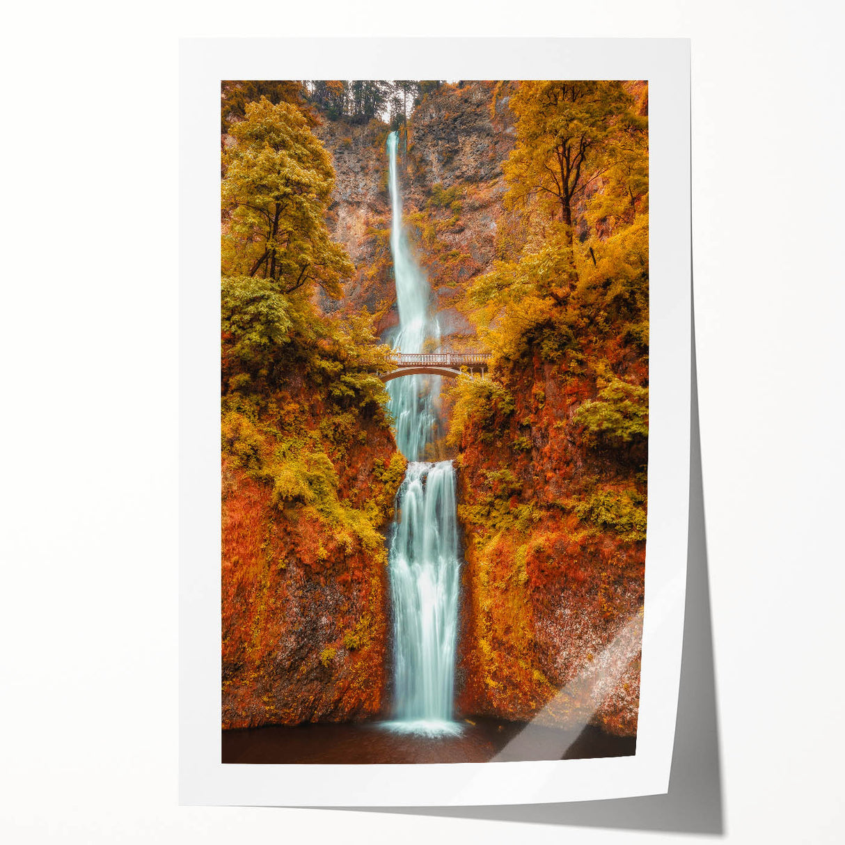 Multnomah Falls depicted in vibrant greens and blues on an extra large rolled print.