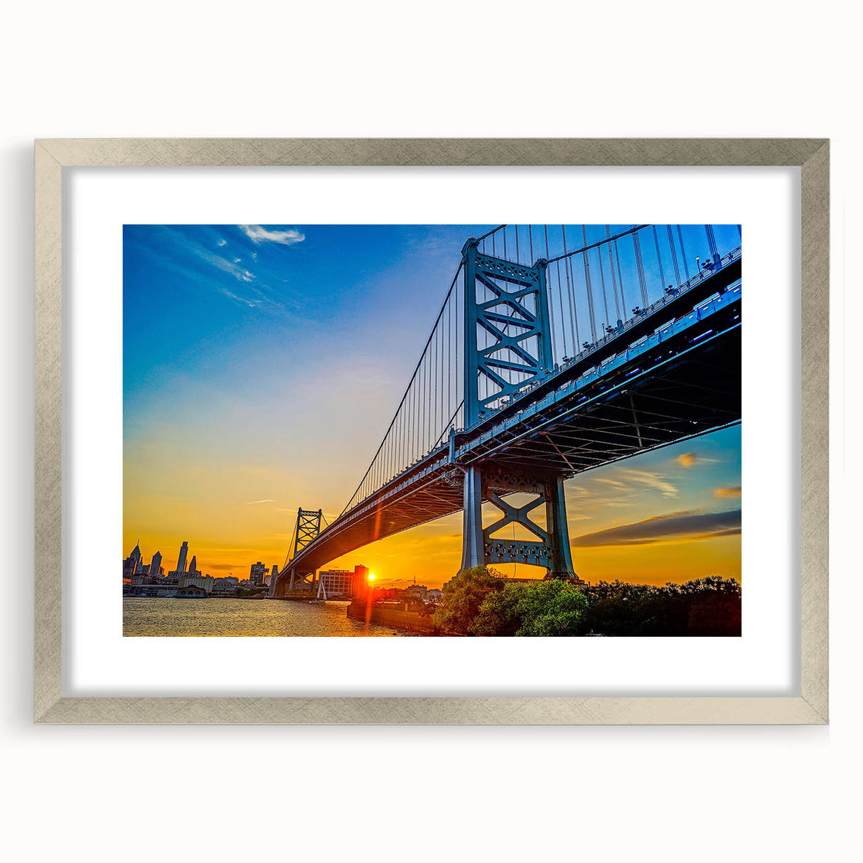 Textured art print of Philadelphia skyline in abstract style with muted earth tones, framed in silver.