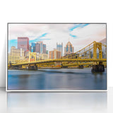 Art deco style Pittsburgh skyline in muted gray and blue tones on a framed acrylic, ideal for modern nursery wall art.