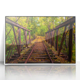 Art deco poster of Pennsylvania scenery in muted blues and greens, acrylic print framed in white.