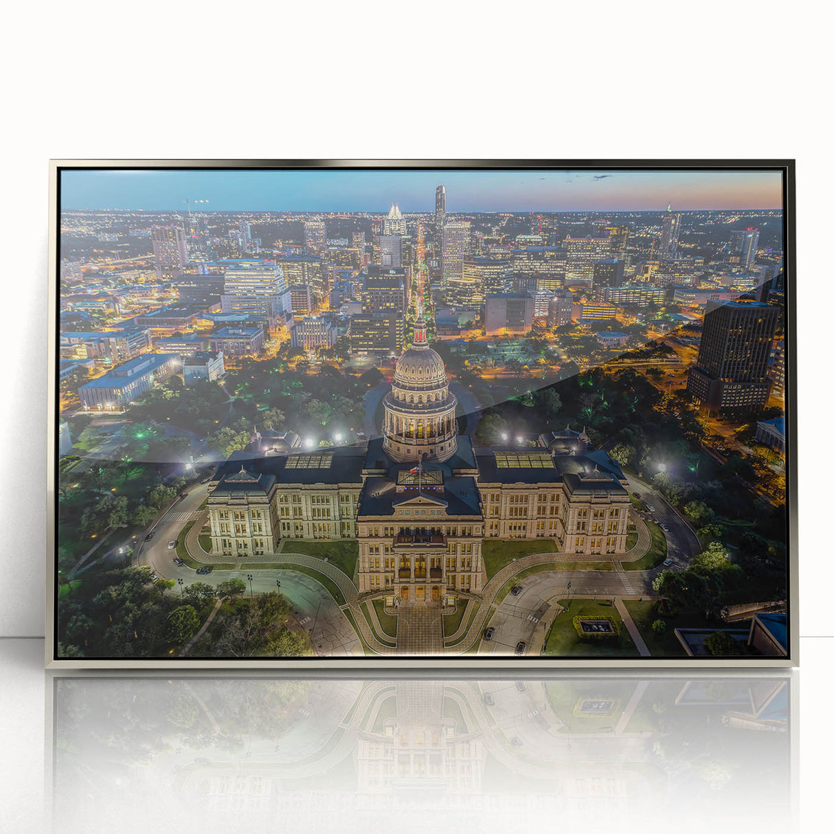 Mid-century modernist art depicting the Austin, Texas skyline in muted gray and blue tones on a framed acrylic print.