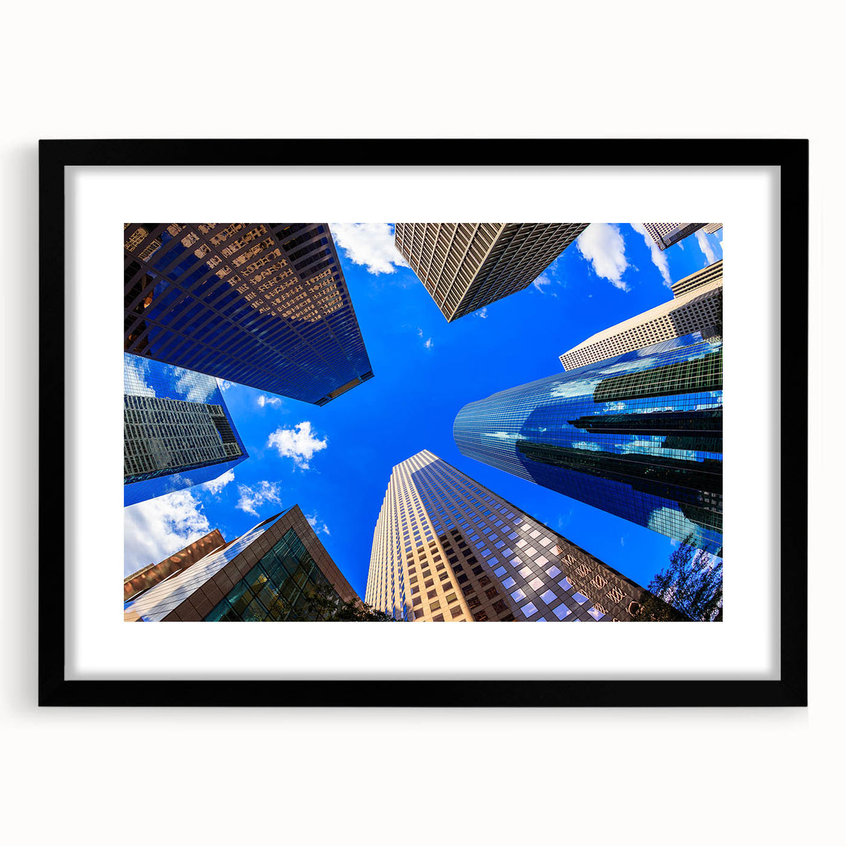 Abstract art print of Houston skyline with vibrant, colorful textures on a large framed canvas.