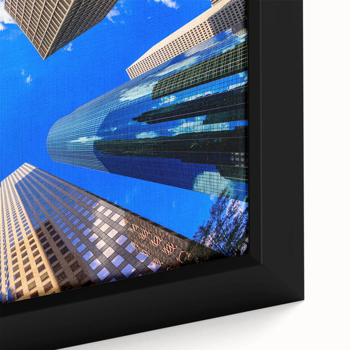 Close-up of a black wall art depicting Houston skyline with vibrant colors on a textured, framed canvas.
