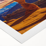 Art deco poster of Arches National Park in muted earth tones on rolled canvas, suitable for dining room decor.