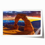 Large rolled print of Arches National Park in Utah, showcasing natural red rock formations under a blue sky.