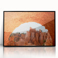 Large abstract wall art depicting Bryce Canyon in muted red and orange tones on a framed acrylic.