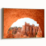 Framed canvas of Bryce Canyon landscape in muted earth tones, ideal for bedroom wall art.