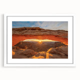 Abstract art print of Canyonlands with vibrant orange and red hues on a white framed canvas, ideal for dining room decor.