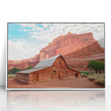 Acrylic print of Capitol Reef, Utah with red rock formations in earthy tones, framed in white.