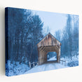 Side view of a large stretched canvas featuring a serene Vermont landscape in muted green and blue tones.