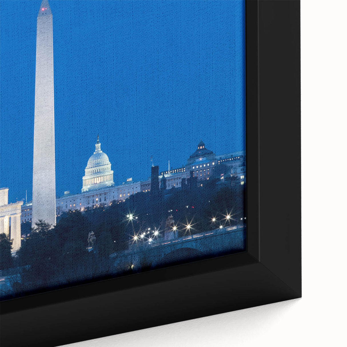Close-up of textured black wall art featuring the Washington DC monument in muted colors on a framed canvas.