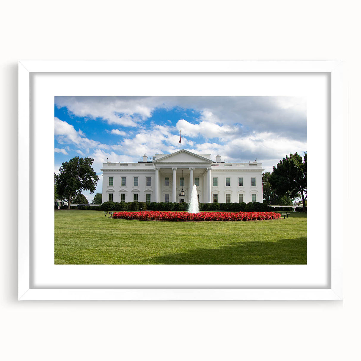 Abstract art print of the White House in muted gray and blue tones, framed with a white mat.