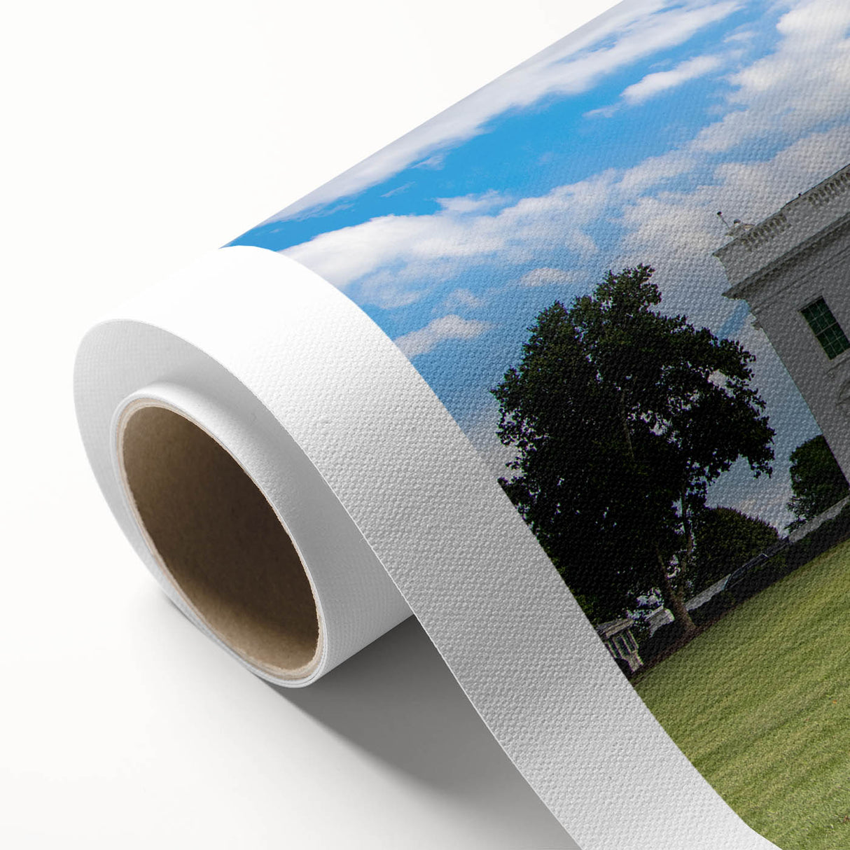 Rolled canvas wall art featuring a scenic view of the White House surrounded by blooming flowers.