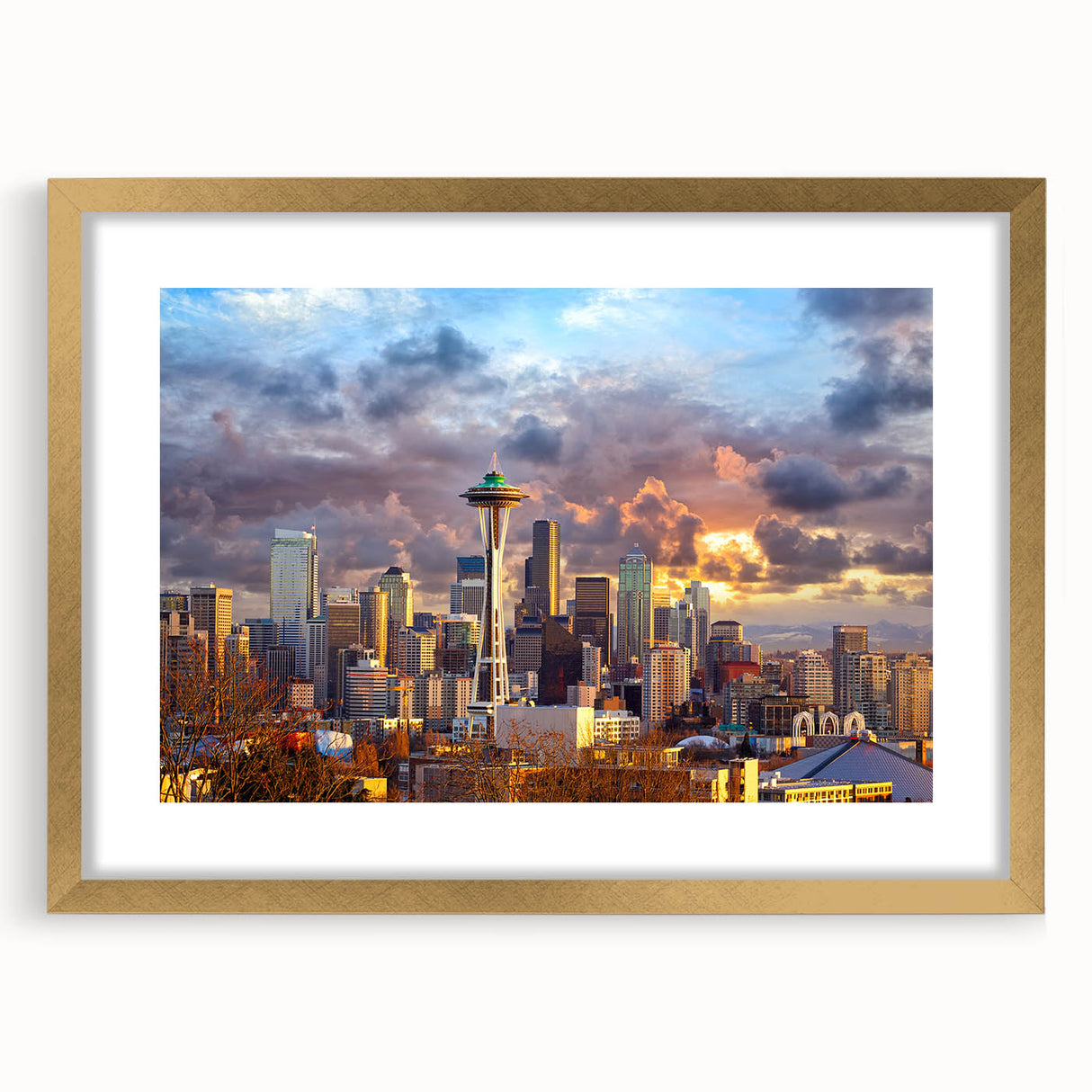 Extra large abstract art print depicting the Seattle skyline in textured gold and blue tones, framed with a mat.