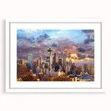 Abstract art print of Seattle skyline in muted gray and blue tones on a framed white mat.