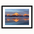 Colorful art depicting an abstract interpretation of the Grand Tetons in vibrant hues on a large framed canvas.