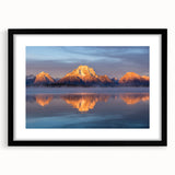 Colorful art depicting an abstract interpretation of the Grand Tetons in vibrant hues on a large framed canvas.