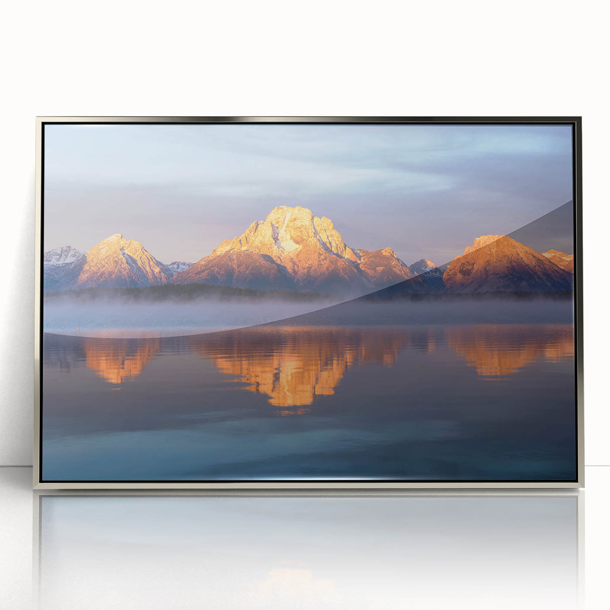 Mid-century modernist art depicting the Grand Tetons, in cool blue and gray tones on a silver-framed acrylic print.