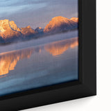 Black wall art featuring a textured depiction of the Grand Tetons in vibrant colors on a framed canvas.