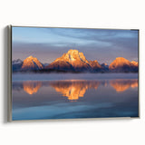 Framed canvas of vintage-style landscape art depicting Wyoming's Grand Tetons, featuring muted earth tones.