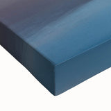 Large art of the Grand Tetons in black and white on stretched canvas, ideal for bedroom wall decor.